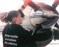 Photo of a student from the Newcastle Aviation Academic working on an aircraft