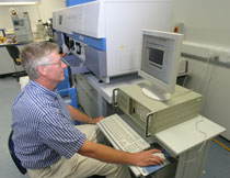 Photo of Dr Ian Jarvis testing the new ICP-AES.