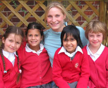 Photo of Anna-Lena Kleinert with pupils from the Mount Primary School.