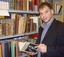 Photo of Dr Vassilis Fouskas in the Vane Ivanovic Library.