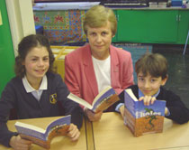 Photo of Liz Broad with pupils from Bishop Gilpin School in Wimbledon.