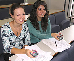 Final year business students Charis Fairhead, left, and Joanna Miltiadou use their remote controls.